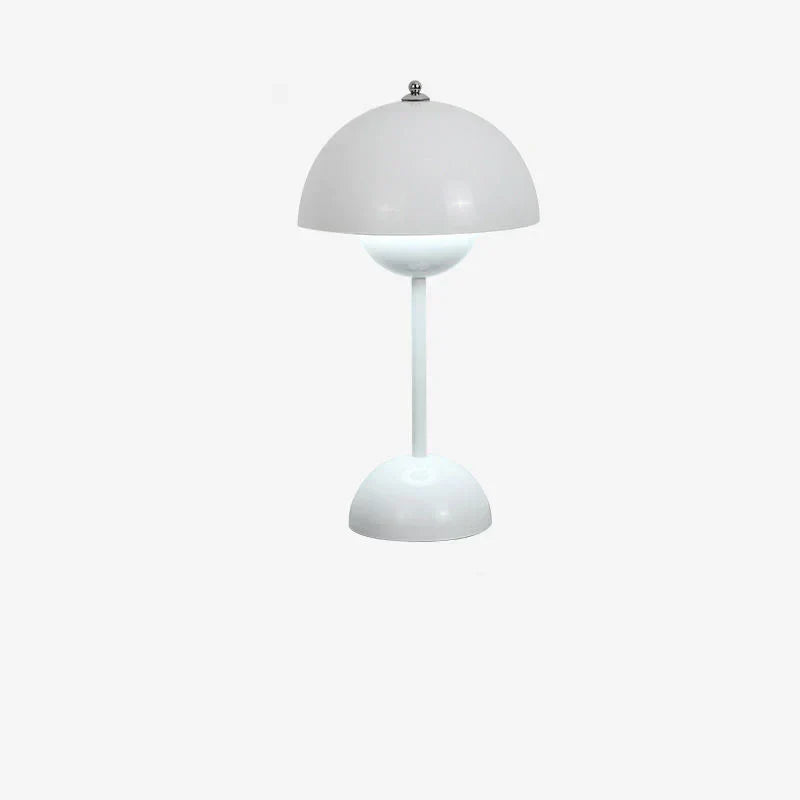 Vit bordslampa med rund form på vit bakgrund