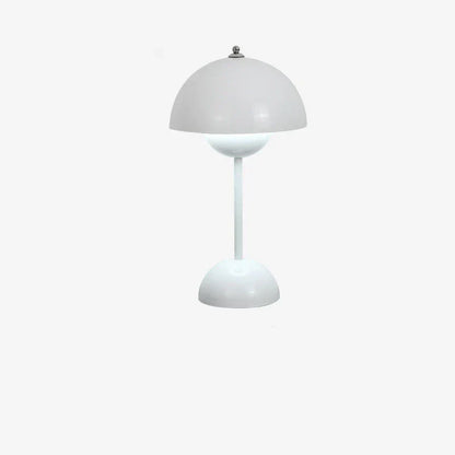 Vit bordslampa med rund form på vit bakgrund