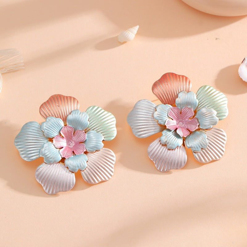 Ladies' flower earrings with intricate design and glossy accents Hapa Style