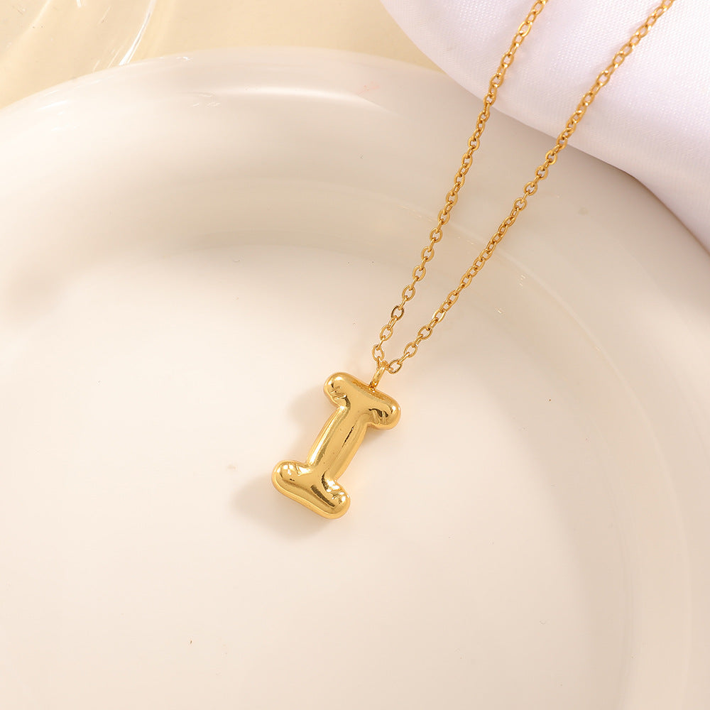 Women's necklace with curved letter pendant Hapa Style