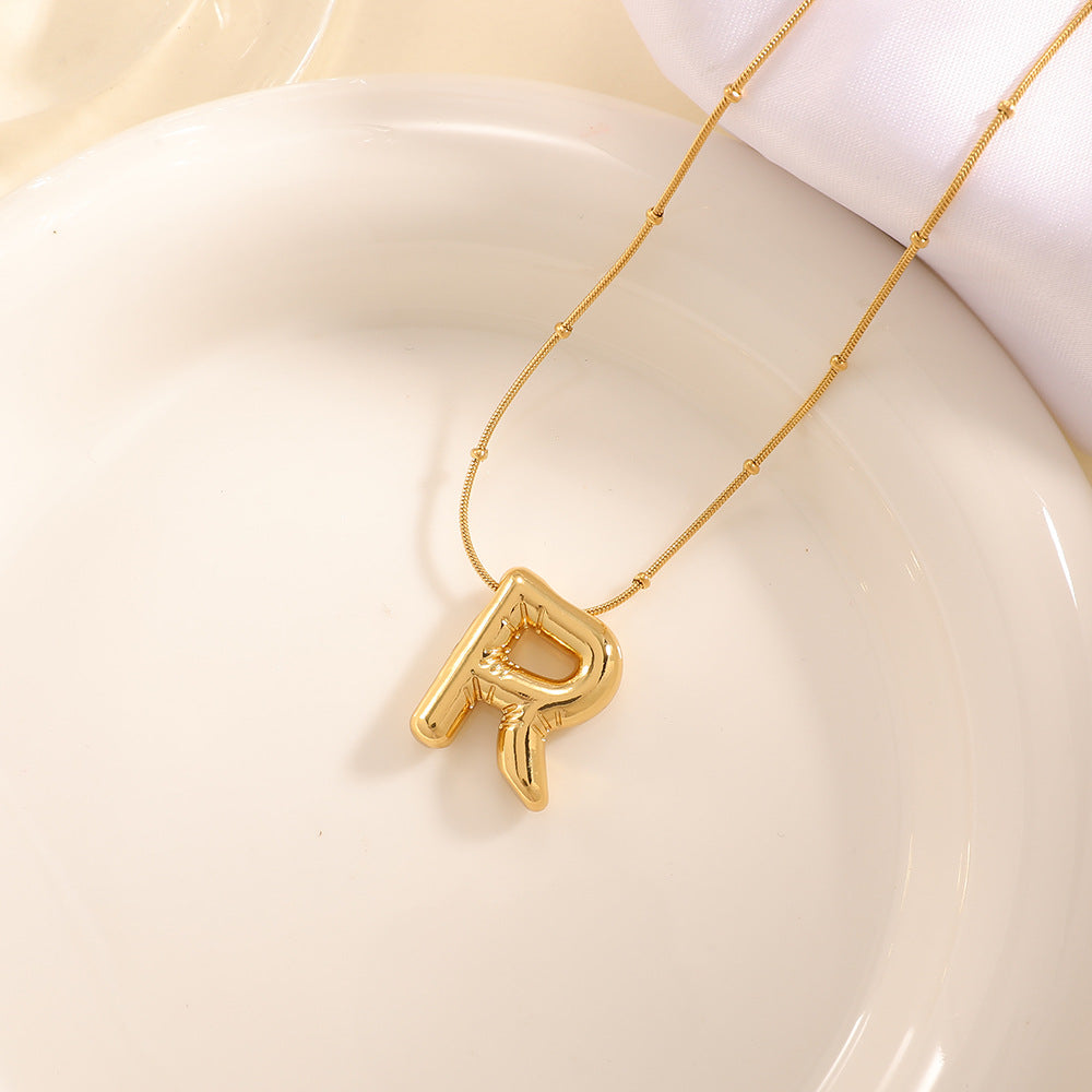 Women's necklace with curved letter pendant Hapa Style