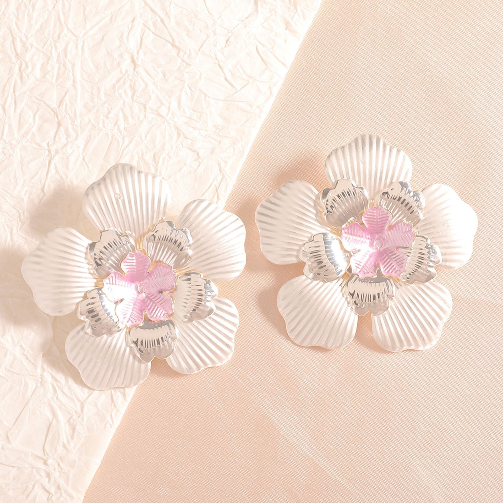 Ladies' flower earrings with intricate design and glossy accents Hapa Style