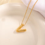 Women's necklace with curved letter pendant Hapa Style