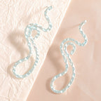 Ladies earrings in elegant wave pattern Hapa Style