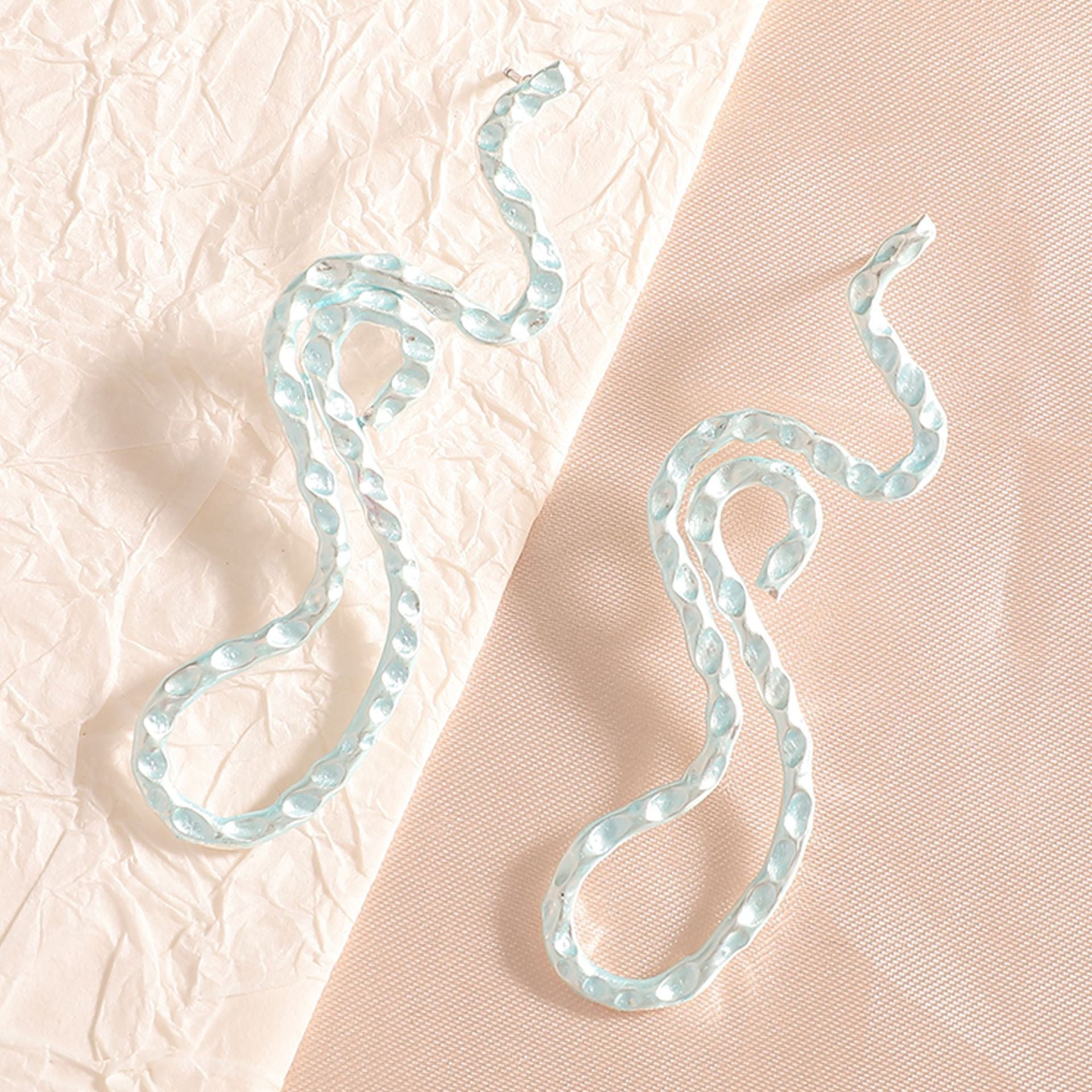Ladies earrings in elegant wave pattern Hapa Style