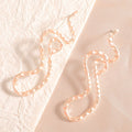 Ladies earrings in elegant wave pattern Hapa Style