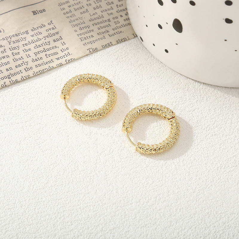 Women's hoop earrings with modern, textured design Hapa Style