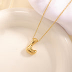 Women's necklace with curved letter pendant Hapa Style