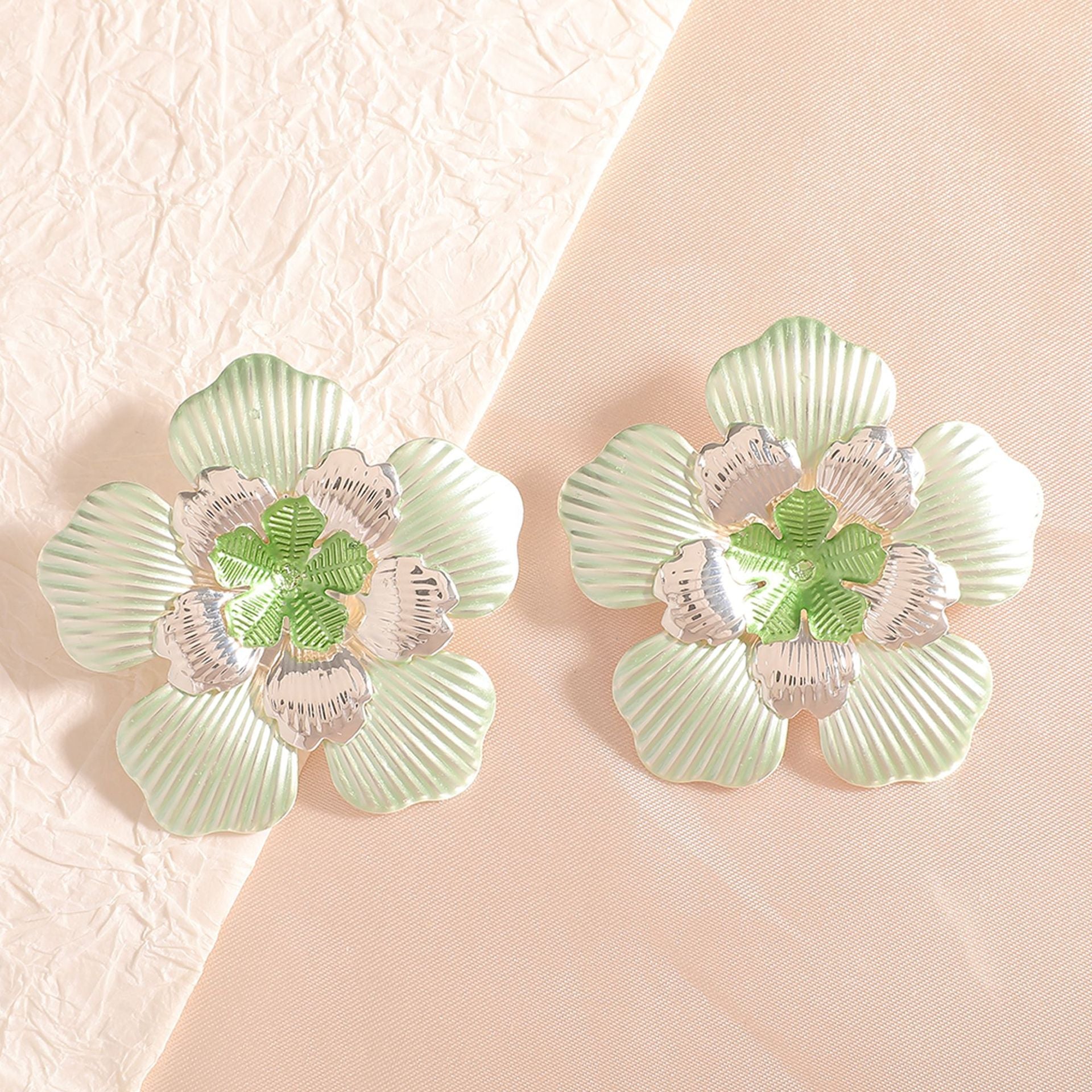 Ladies' flower earrings with intricate design and glossy accents Hapa Style