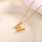 Women's necklace with curved letter pendant Hapa Style