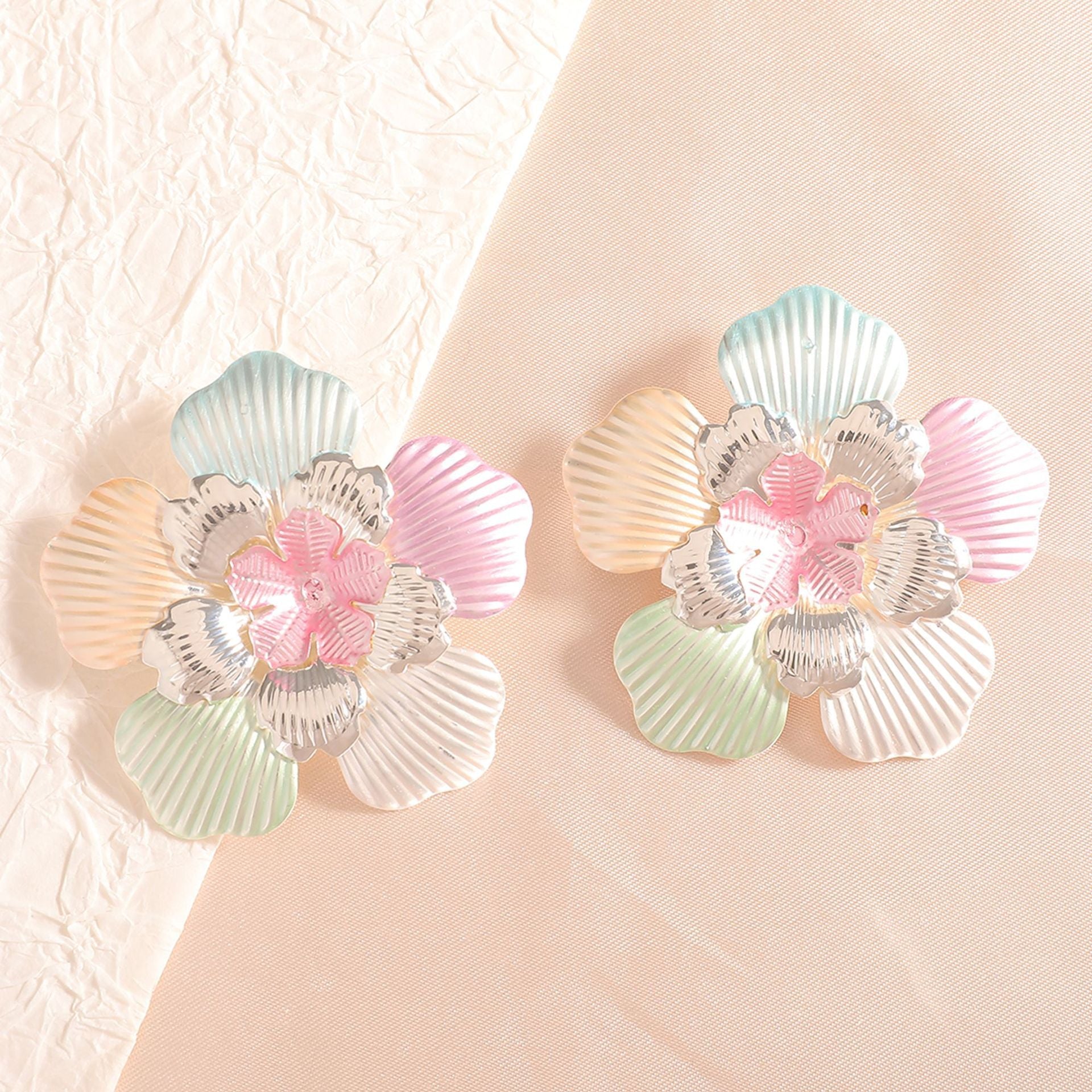Ladies' flower earrings with intricate design and glossy accents Hapa Style