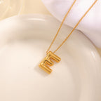 Women's necklace with curved letter pendant Hapa Style