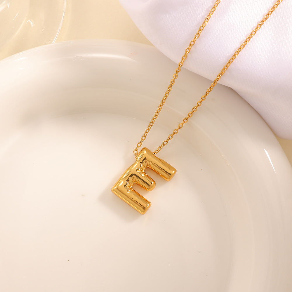 Women's necklace with curved letter pendant Hapa Style