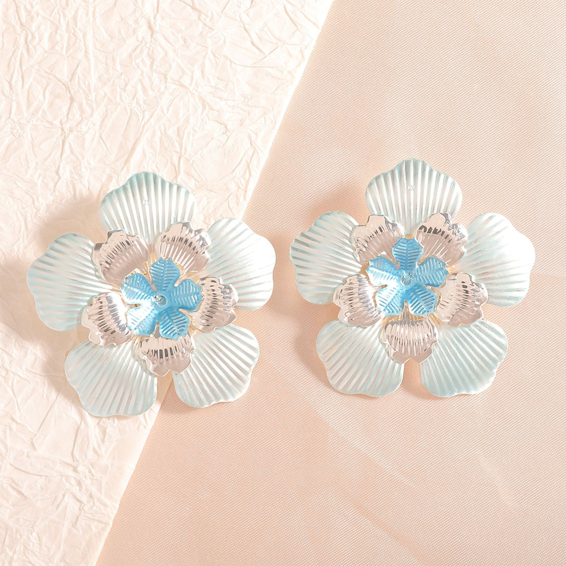 Ladies' flower earrings with intricate design and glossy accents Hapa Style