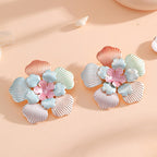 Ladies' flower earrings with intricate design and glossy accents Hapa Style