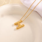 Women's necklace with curved letter pendant Hapa Style