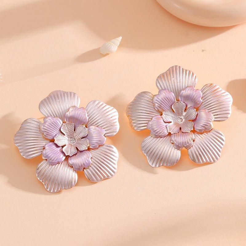 Ladies' flower earrings with intricate design and glossy accents Hapa Style