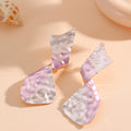Ladies earrings in modern disc design Hapa Style