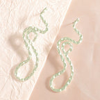 Ladies earrings in elegant wave pattern Hapa Style
