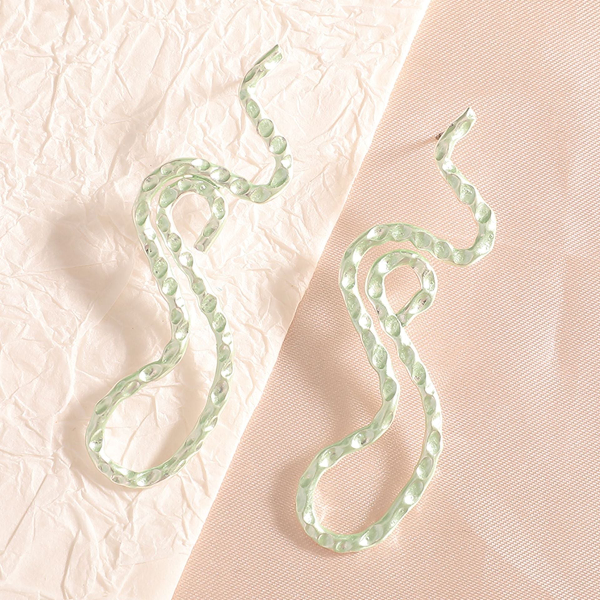 Ladies earrings in elegant wave pattern Hapa Style