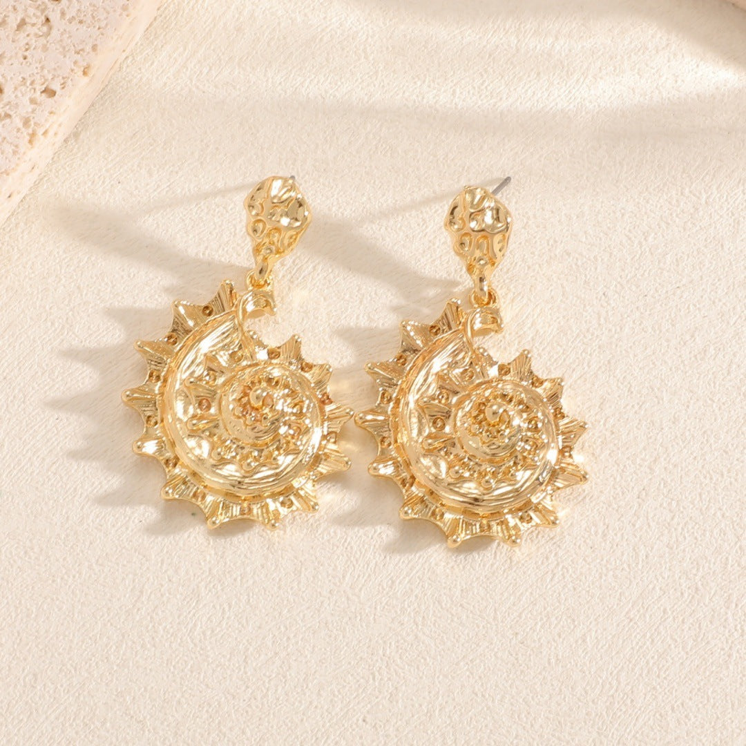 Ladies earrings in shell design Hapa Style