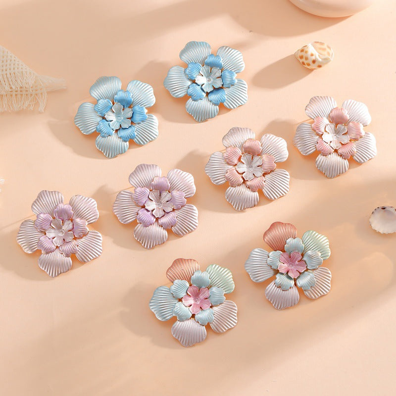 Ladies' flower earrings with intricate design and glossy accents Hapa Style