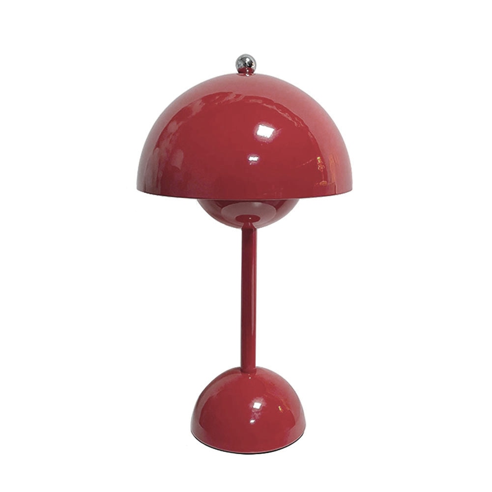 Röd bordslampa med blank yta