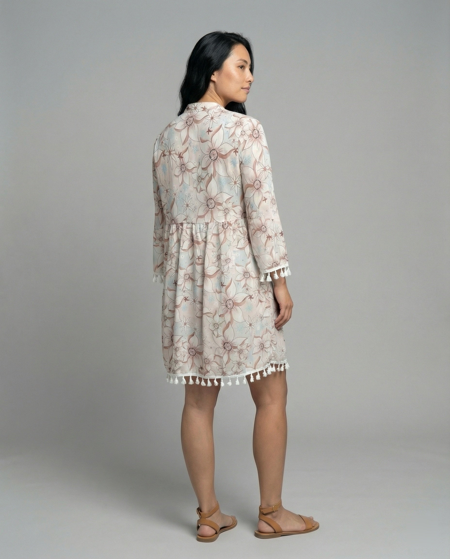 Women’s beach dress with high collar and romantic floral pattern