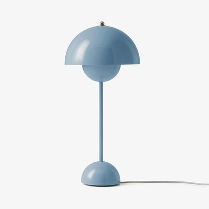 Ljusblå bordslampa med rund form