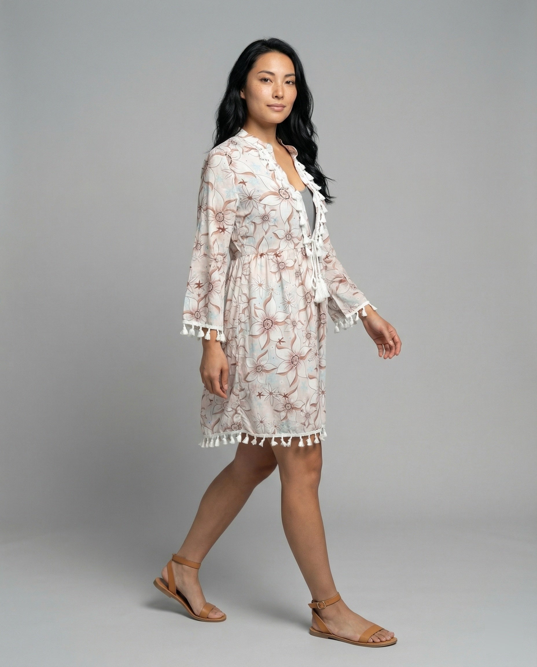 Women’s beach dress with high collar and romantic floral pattern