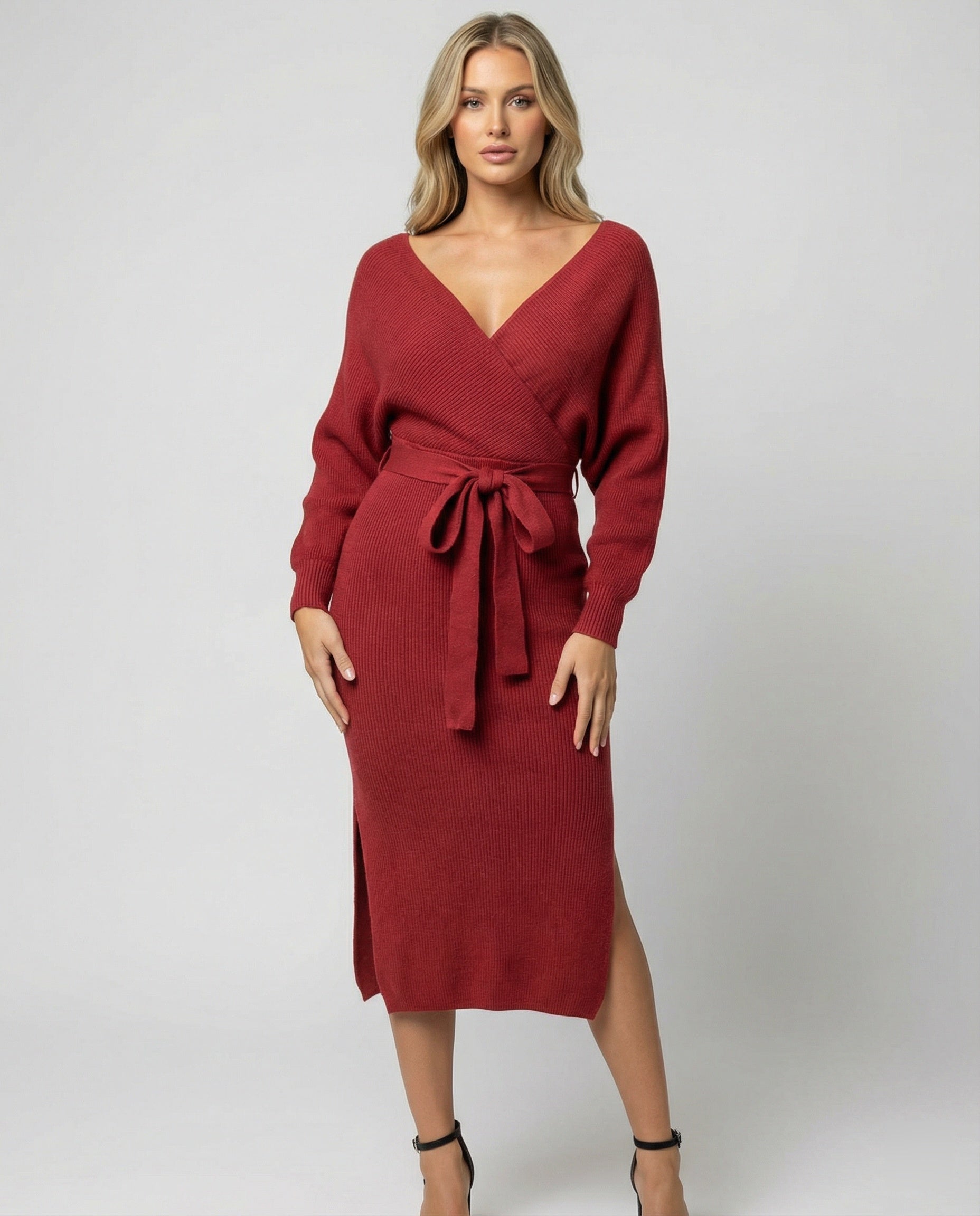 Ladies knit dress with elegant wrap design and decorative belt
