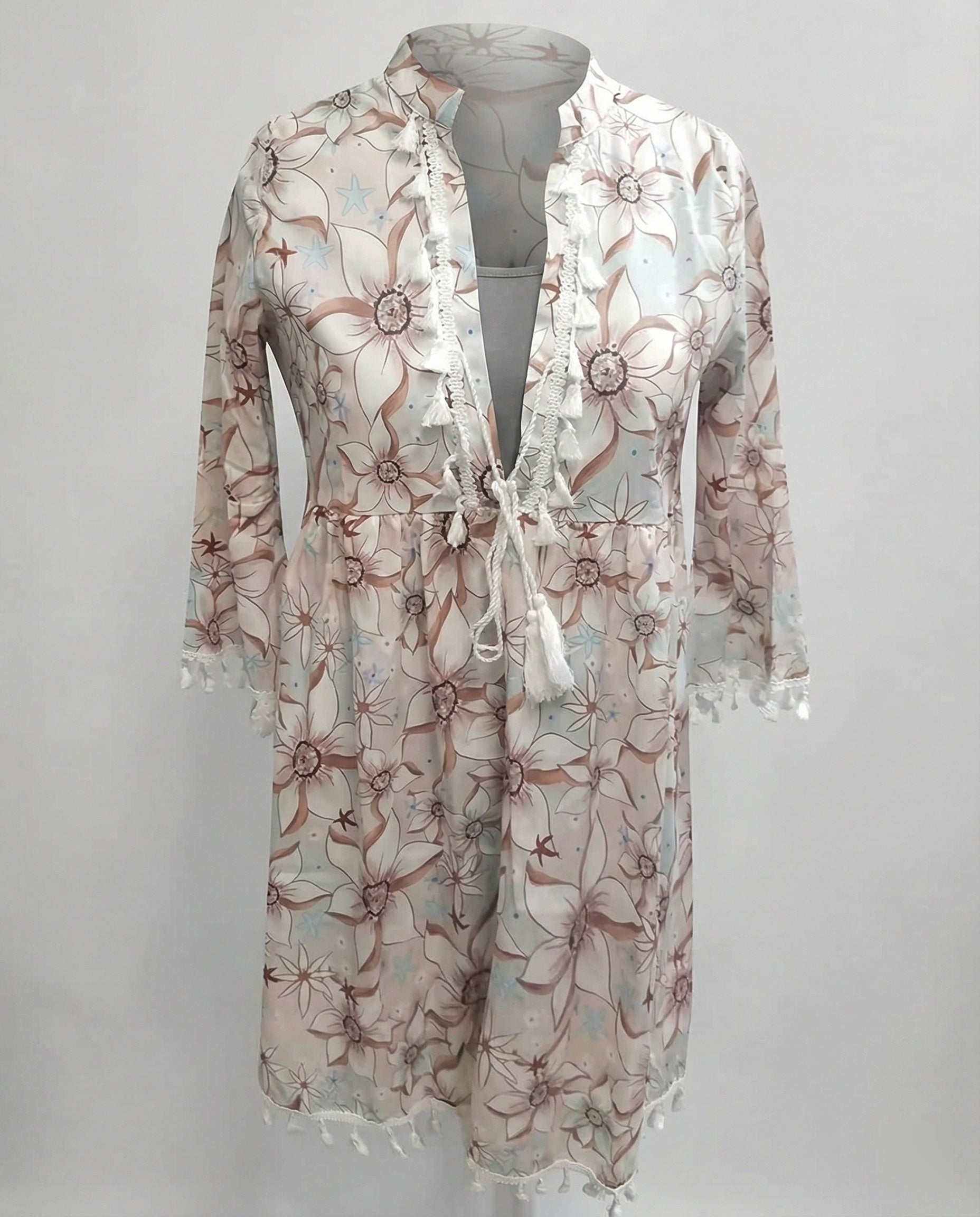Women’s beach dress with high collar and romantic floral pattern